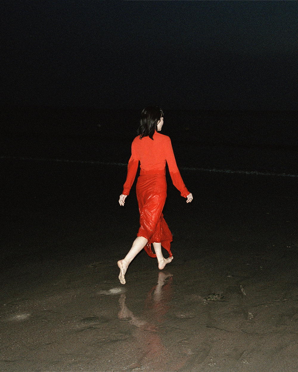 Red dress in Red fabric, model shot, Back view Long sleeve, midi length
