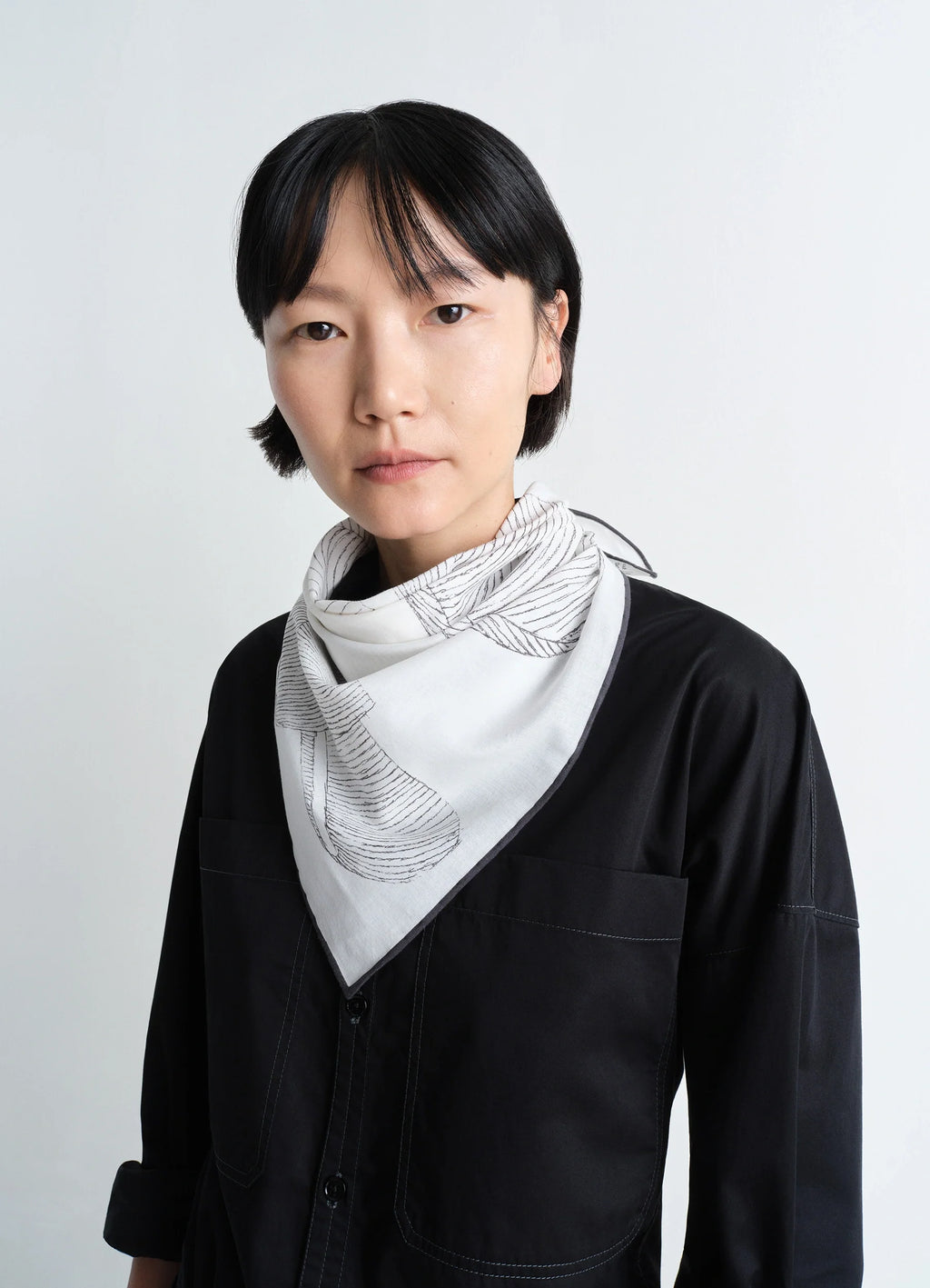 Philippe weisbecker bandana in 60 green houses cotton, model shot, front view printed design