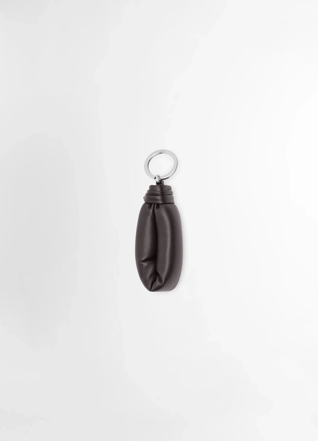 Wadded key holder in soft nappa leather, product shot, front view wadded leather shape