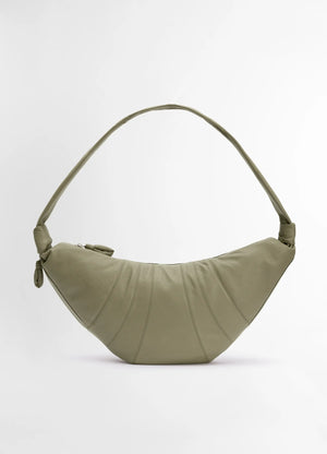 Lemaire large croissant bag in soft grained leather, product shot, front view crescent shape detail