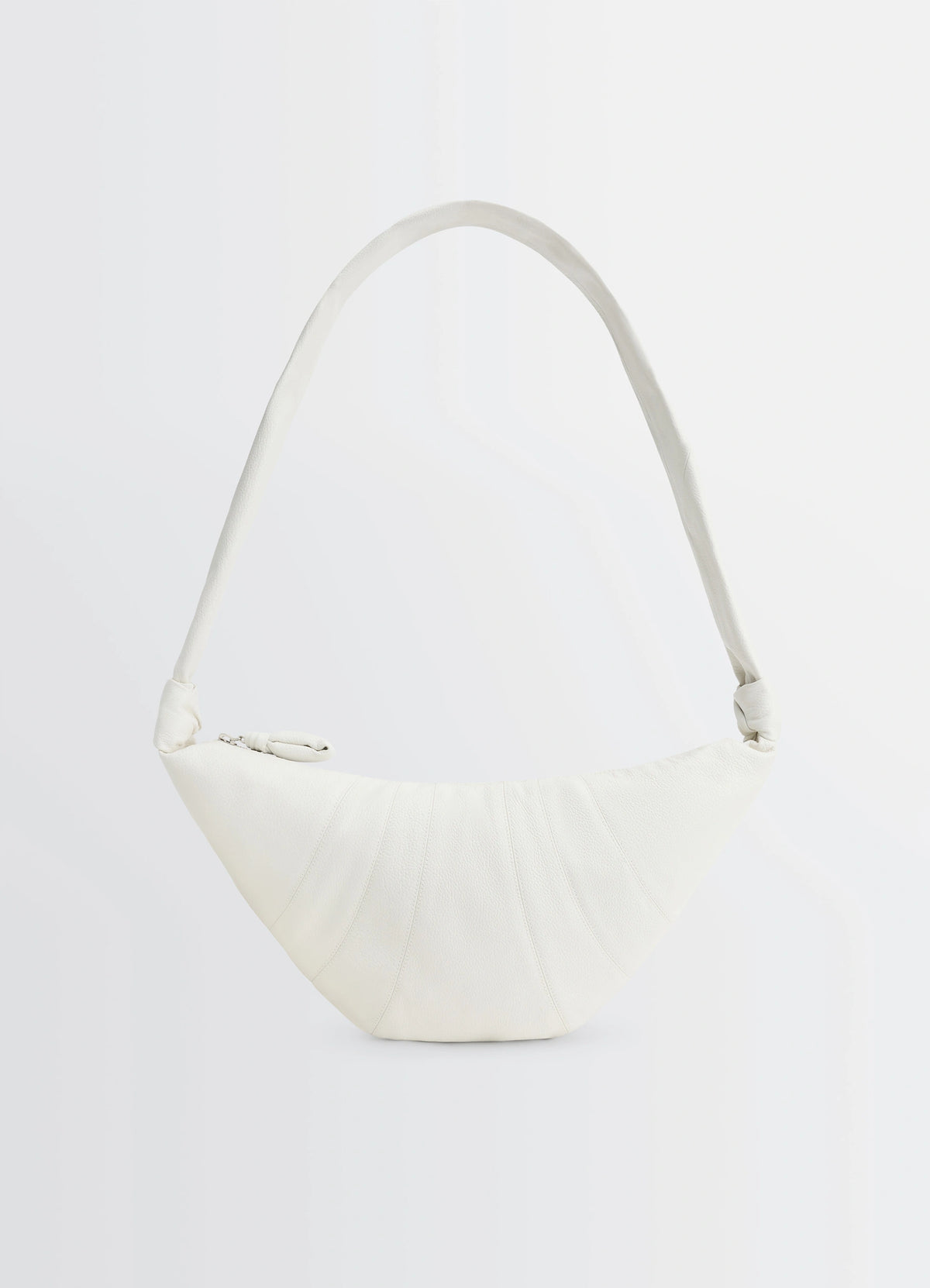 Lemaire Medium Croissant Bag in Soft Grained Leather White, product shot, Front view Curved shape with side knots