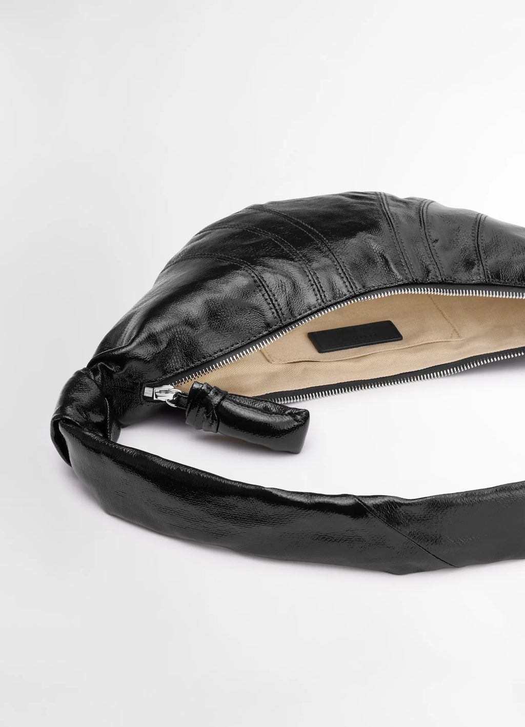 Lemaire small croissant bag in black coated cotton, product shot, zipper detail shot open top view