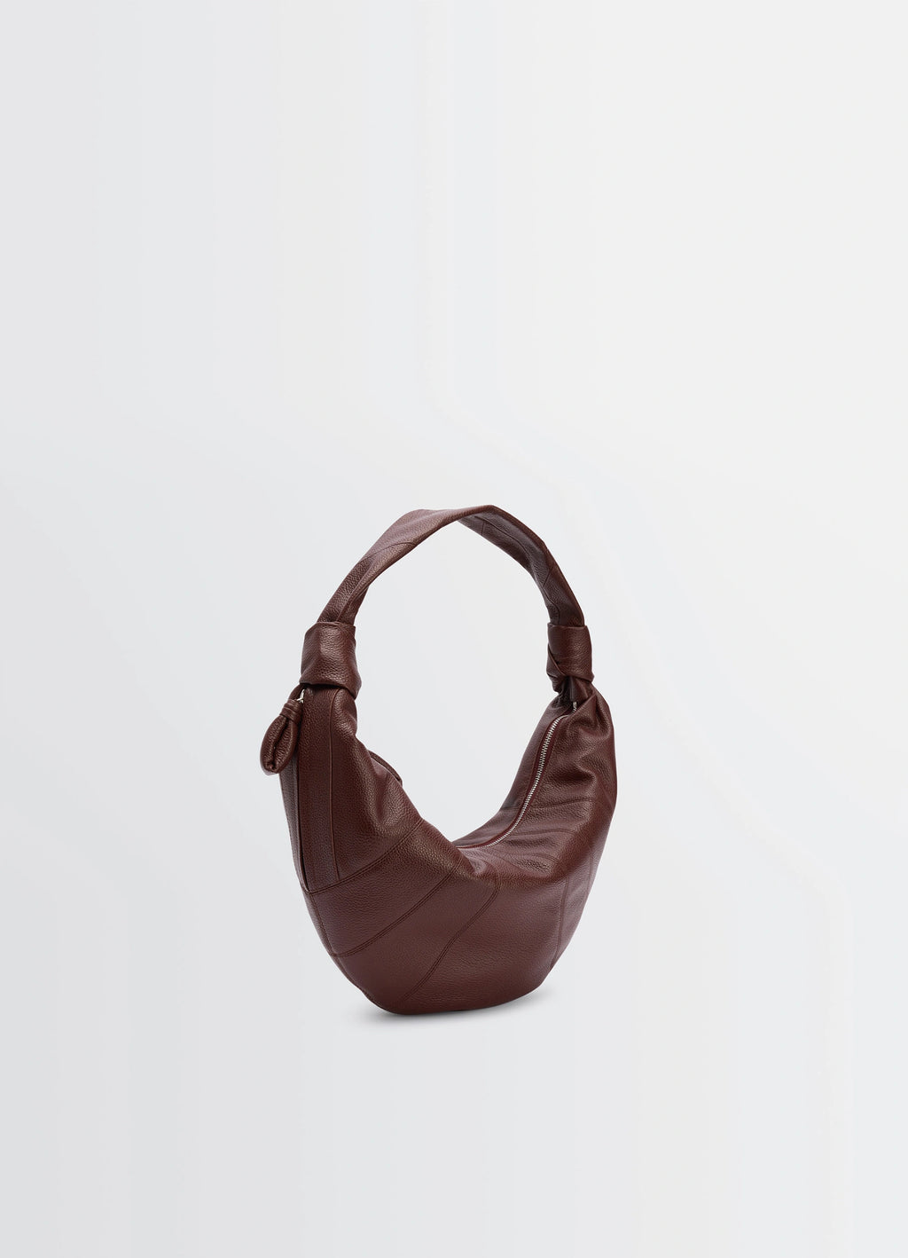 Fortune croissant bag in grained leather, product shot, angled view textured surface