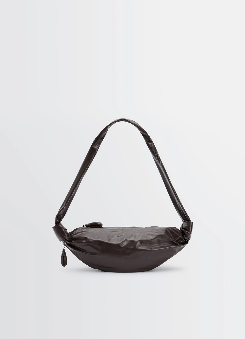 Small soft croissant bag in paper-effect leather, product shot, side view slouchy structure