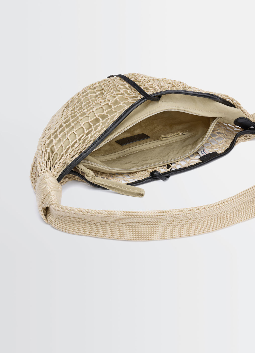 Fortune croissant filt bag in nylon net, product shot, top interior view open mesh with pockets