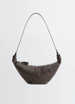 Rail belt medium croissant bag in grained leather in brown, product shot, front view topstitching with clasp closure