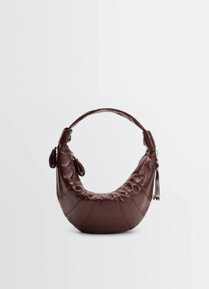 Lemaire fortune croissant bag in coated cotton canvas, product shot, front view knotted side elements