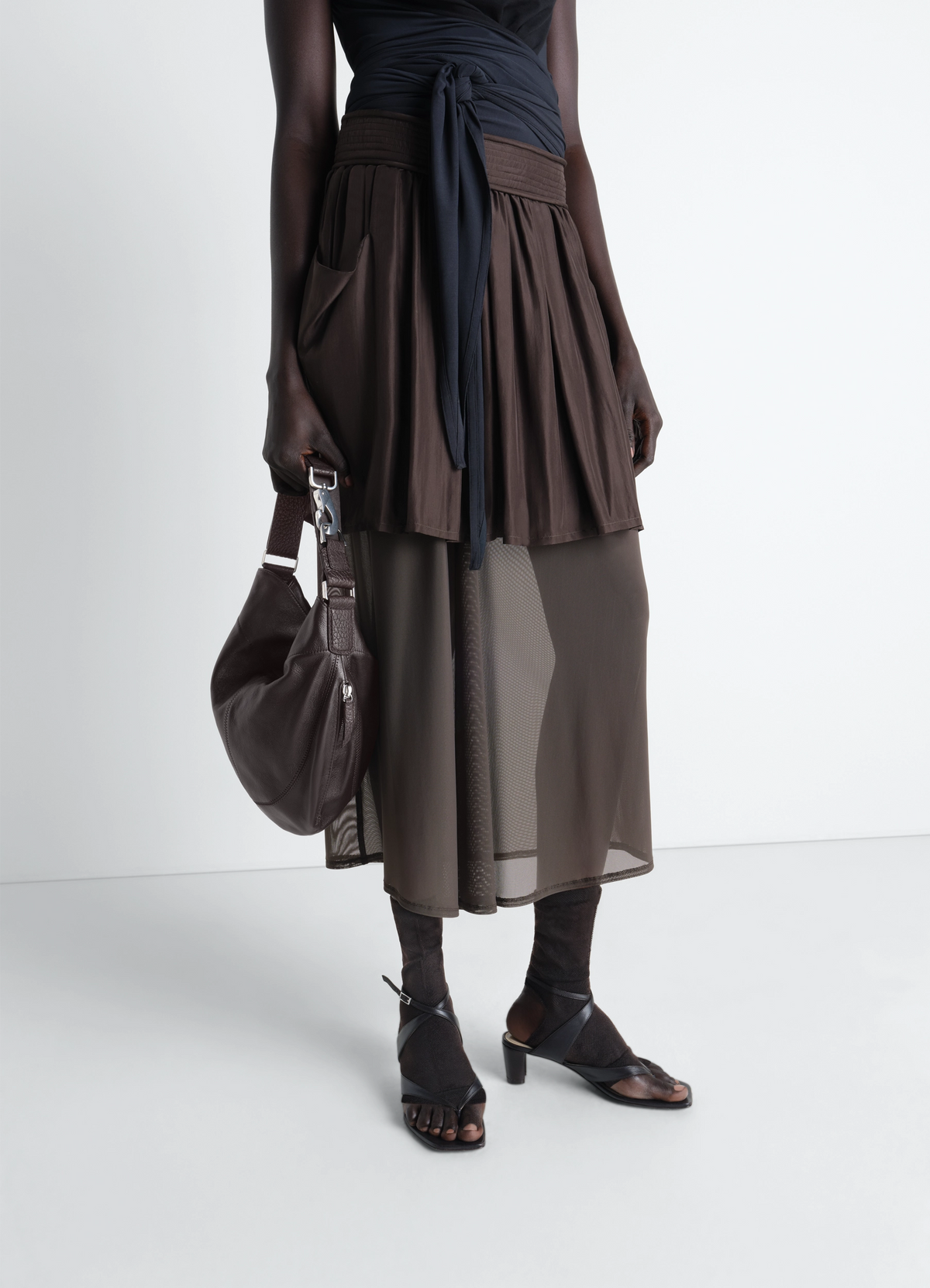 HOBO QUIVER CLIP BAG IN LEATHER