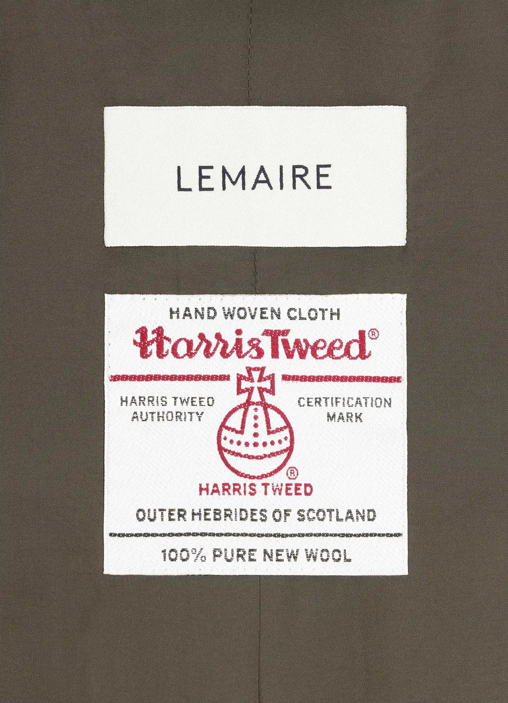 Chesterfield coat in herringbone harris tweed, fabric label close-up woven certification label