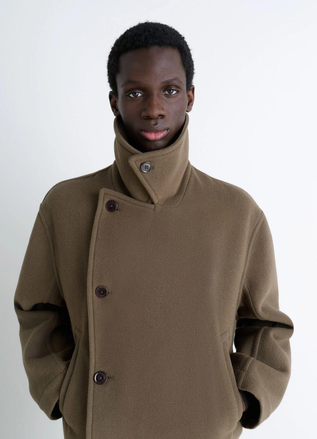 Lemaire boxy peacoat in double-faced wool, model shot, close-up view high collar