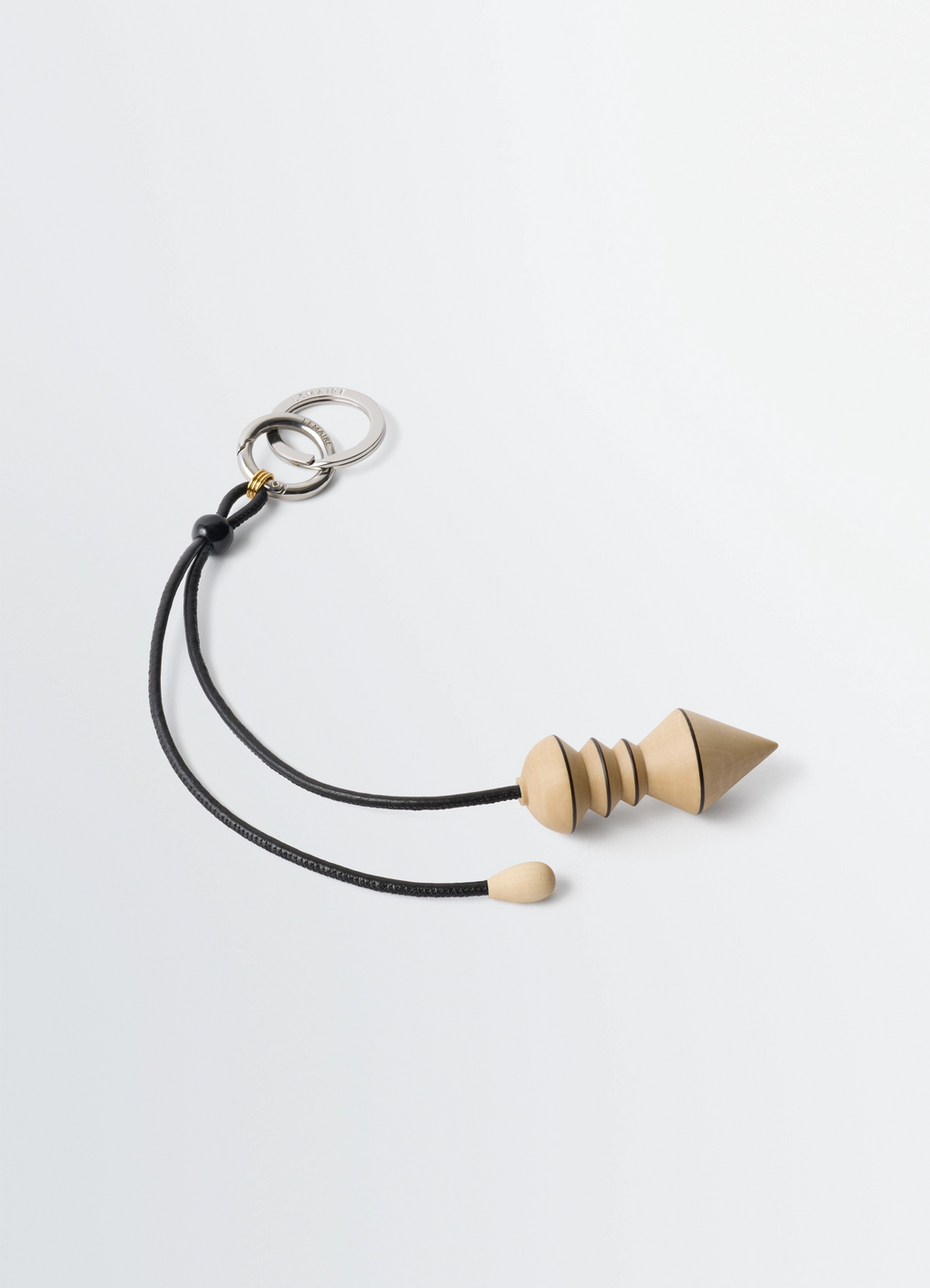 나무 소재의 펜듈럼 가방 참