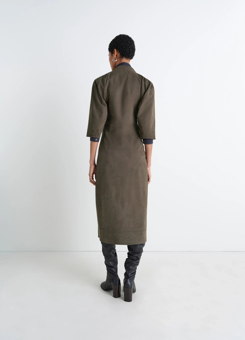 Lemaire leather v-neck dress in nubuck leather, model shot, back view three-quarter sleeves, straight cut
