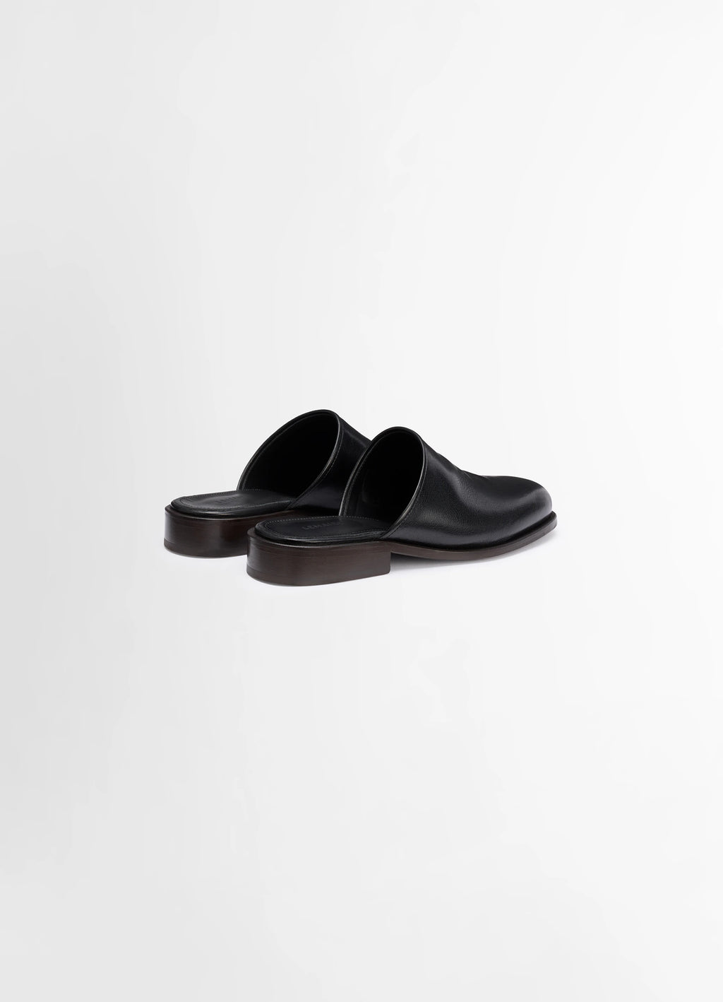 Lemaire square mule in black vegetable-tanned buffalo leat, product shot, rear three-quarter view low heel sleek design