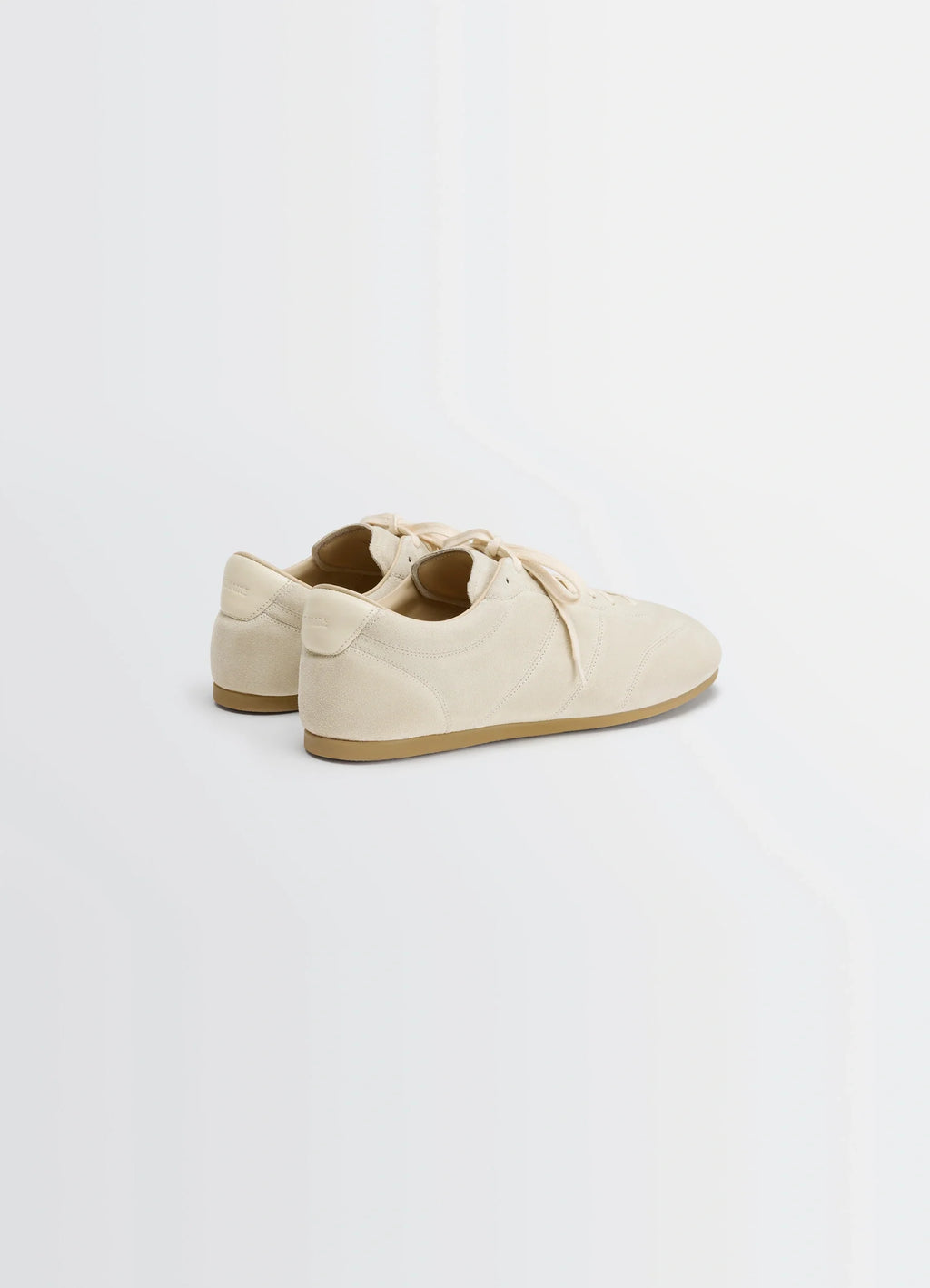 Soft runner in cream hand-sueded lambskin, product shot, rear three-quarter view rounded heel design