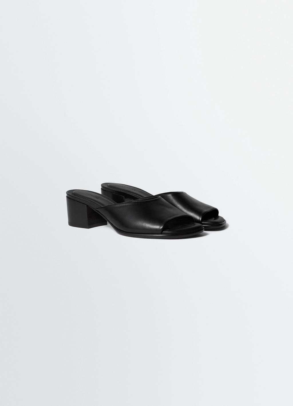 Square-heeled mules 55 mm in leather