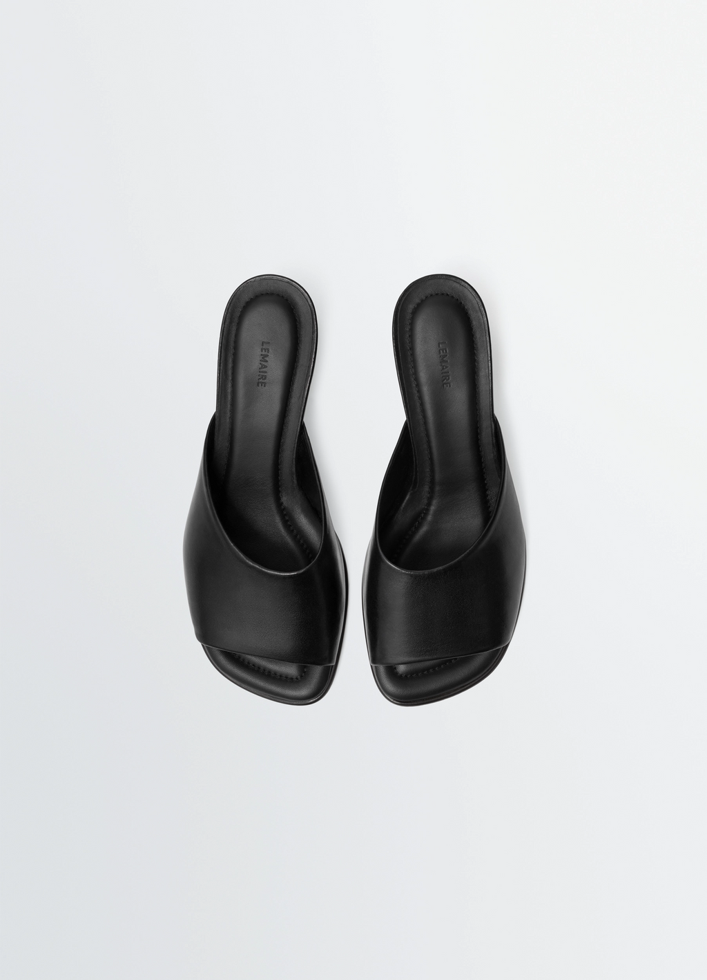 Square-heeled mules 55 mm in leather