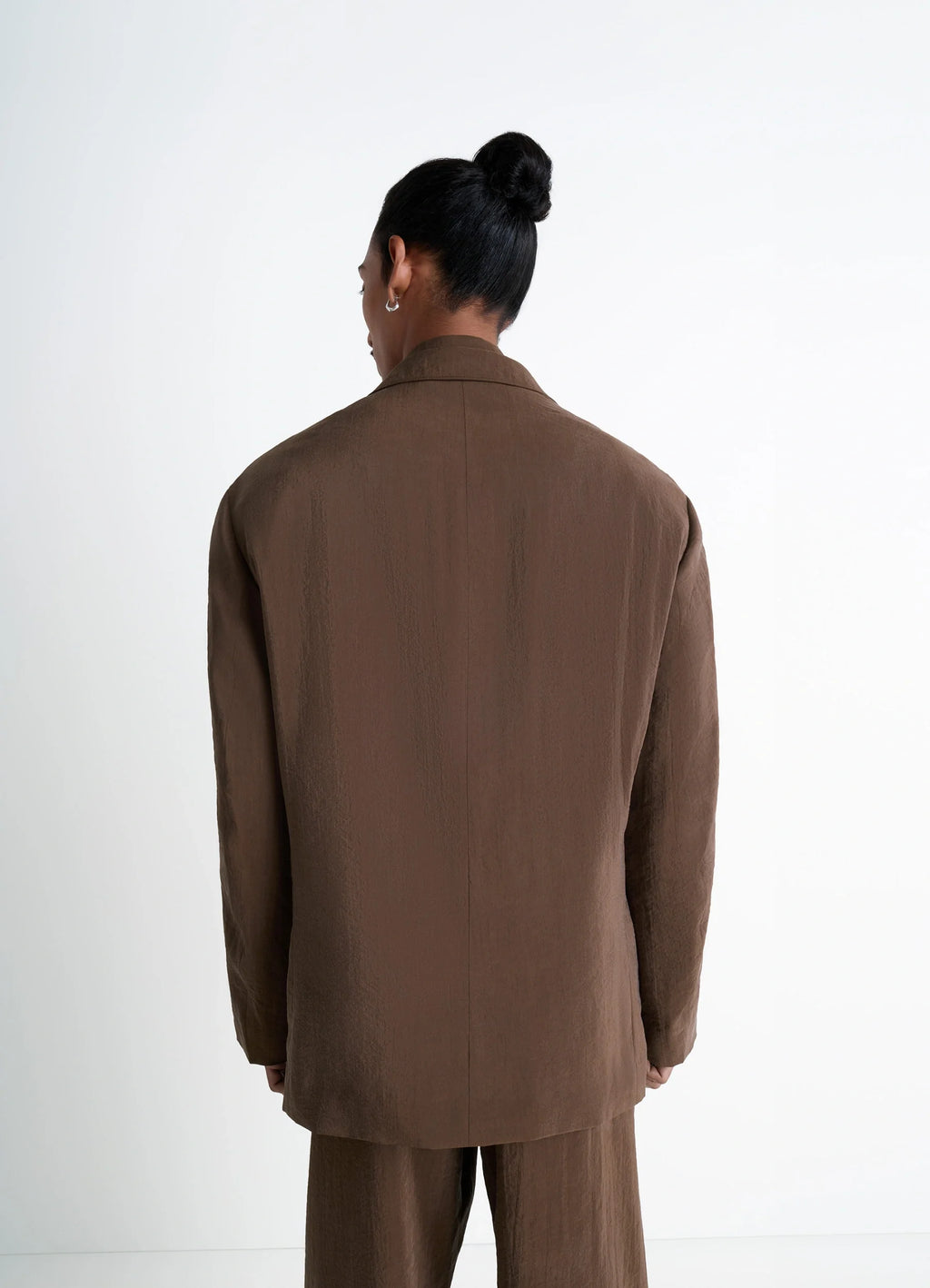 Lemaire soft double-breasted jacket in heather brown dry silk blend, model shot, back view straight back seam