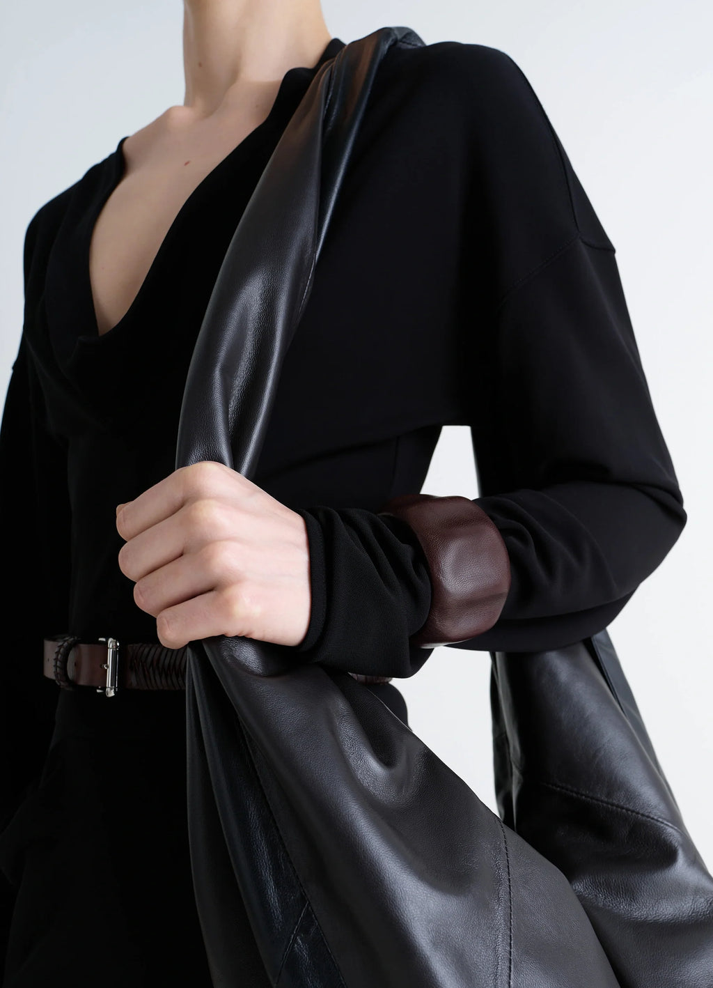 Lemaire carlos cuff in brown goats leather, model shot, close-up detail shot visible leather texture