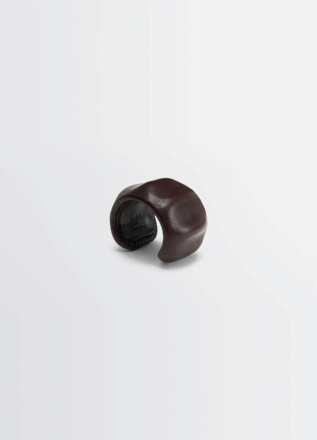 Lemaire carlos cuff in brown goats leather, product shot, top view sculptural curve