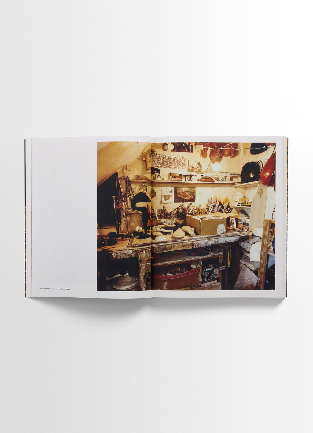 Carlos peñafiel book in molded leather, product shot, side open display interior page detail