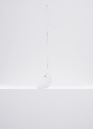 Cross-body croissant coin purse in soft grained leather, product shot, side view topstitched cutouts