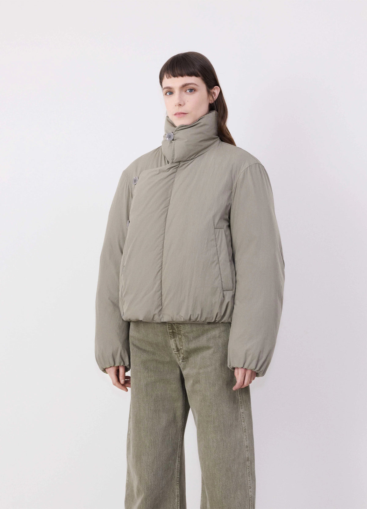 Lemaire Short Puffer Blouson in Light Cotton Blend, model shot, Front side angle Rounded silhouette
