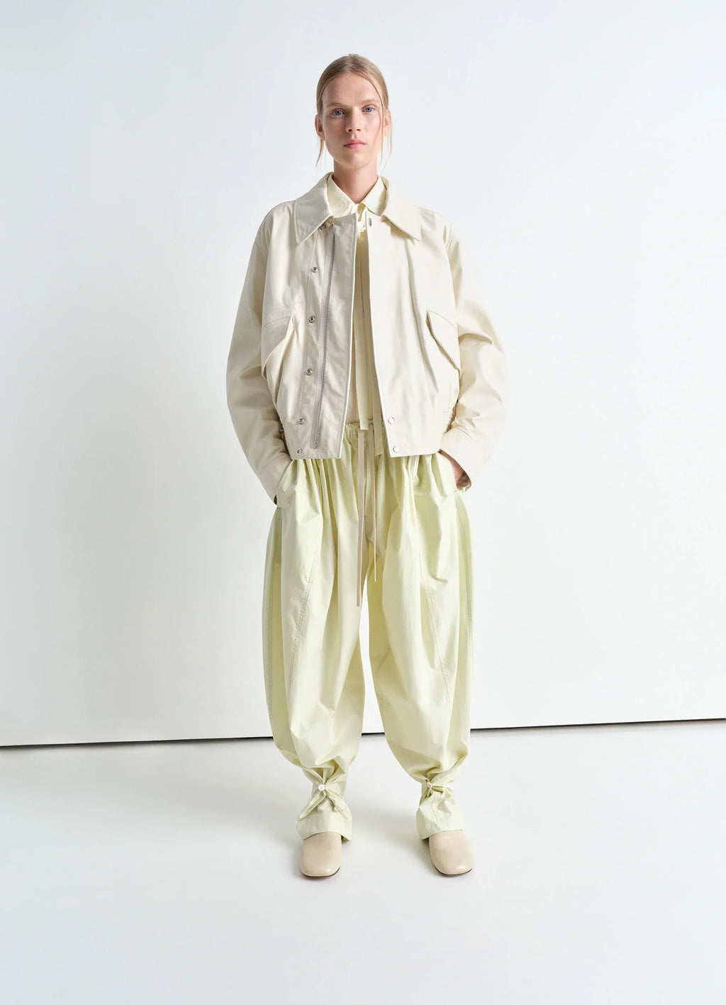 Philippe weisbecker bandana in 60 green houses cotton, model shot, full body porte styled with light jacket