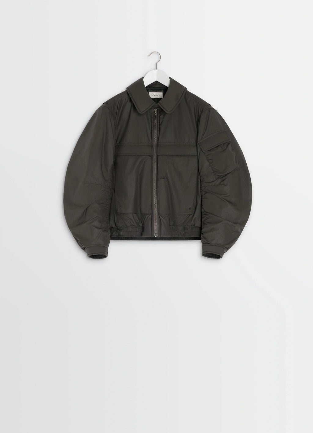 Lemaire short bomber in olive water-repellent nylon, product shot, hanger display shot puff sleeves visible