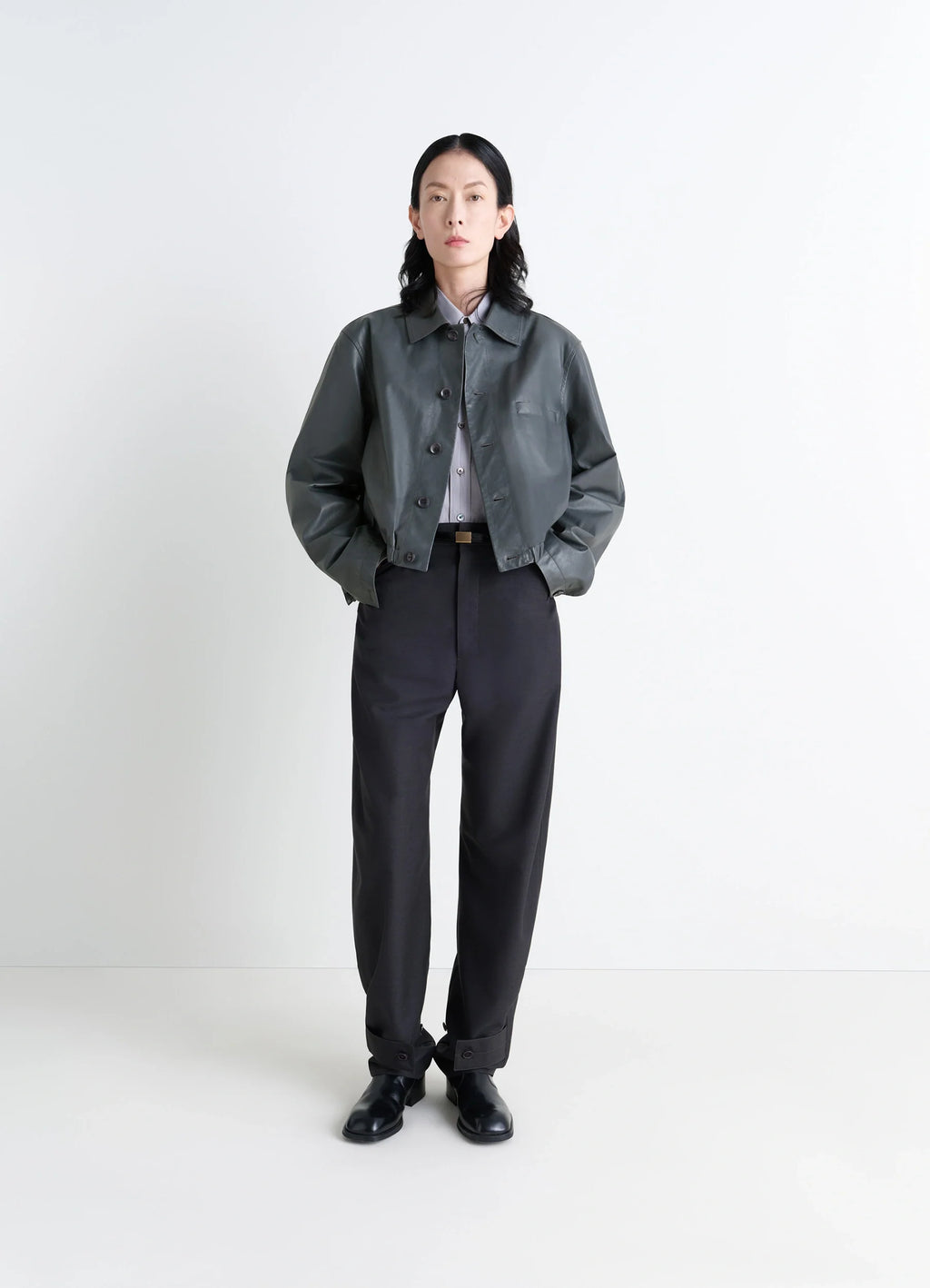 Lemaire soft leather blouson in soft cow leather, model shot, porte front-view full-body buttoned, relaxed shoulders