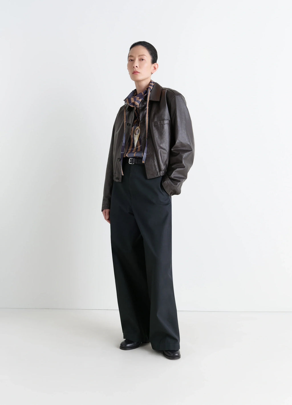 Lemaire soft leather blouson in soft cow leather, model shot, three-quarter view button-up, relaxed fit