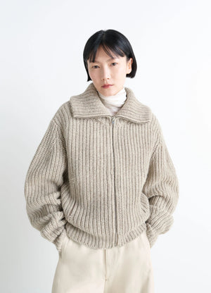 Zip-up cardigan with stand-up colla in alpaca and yak wool knit, model shot, front view densely ribbed, textured look