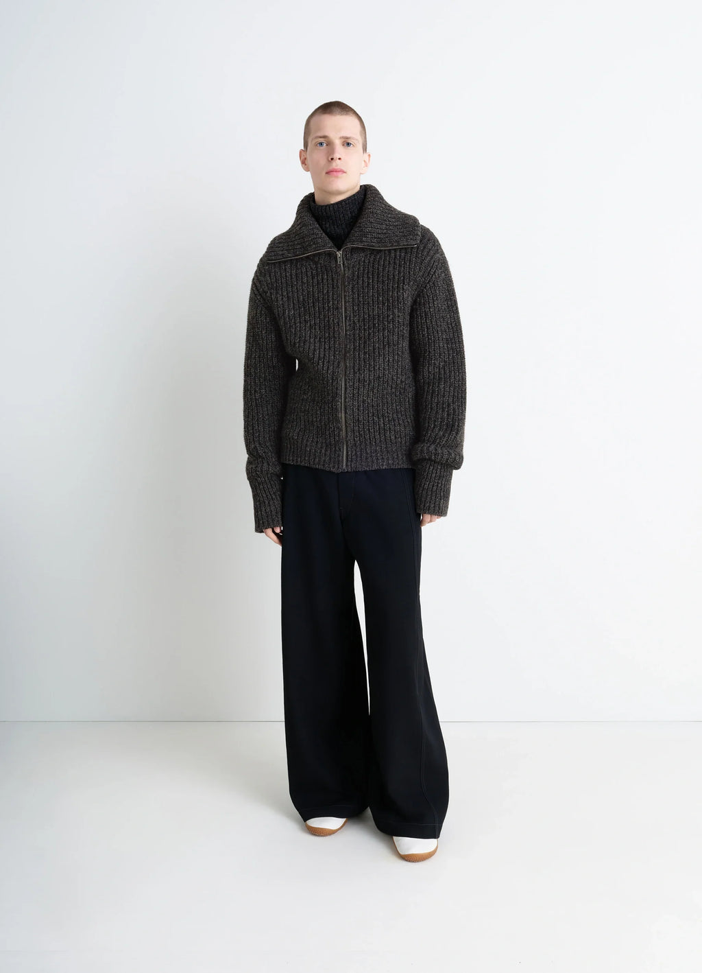 Crafted zip-up cardigan in heather alpaca yak wool, model shot, front view stand-up collar design