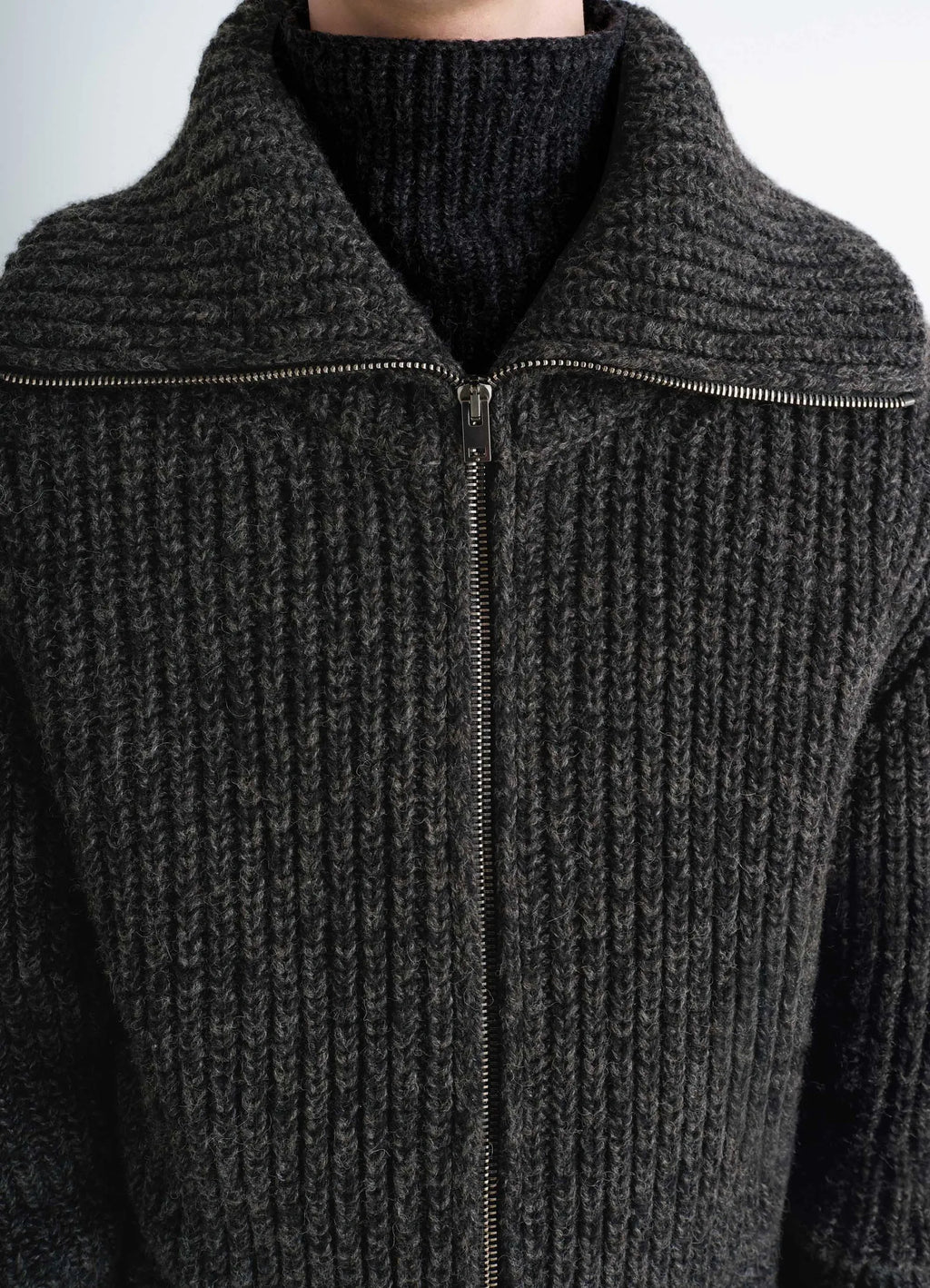 Crafted zip-up cardigan in heather alpaca yak wool, model shot, close-up detail shot wide collar open zip