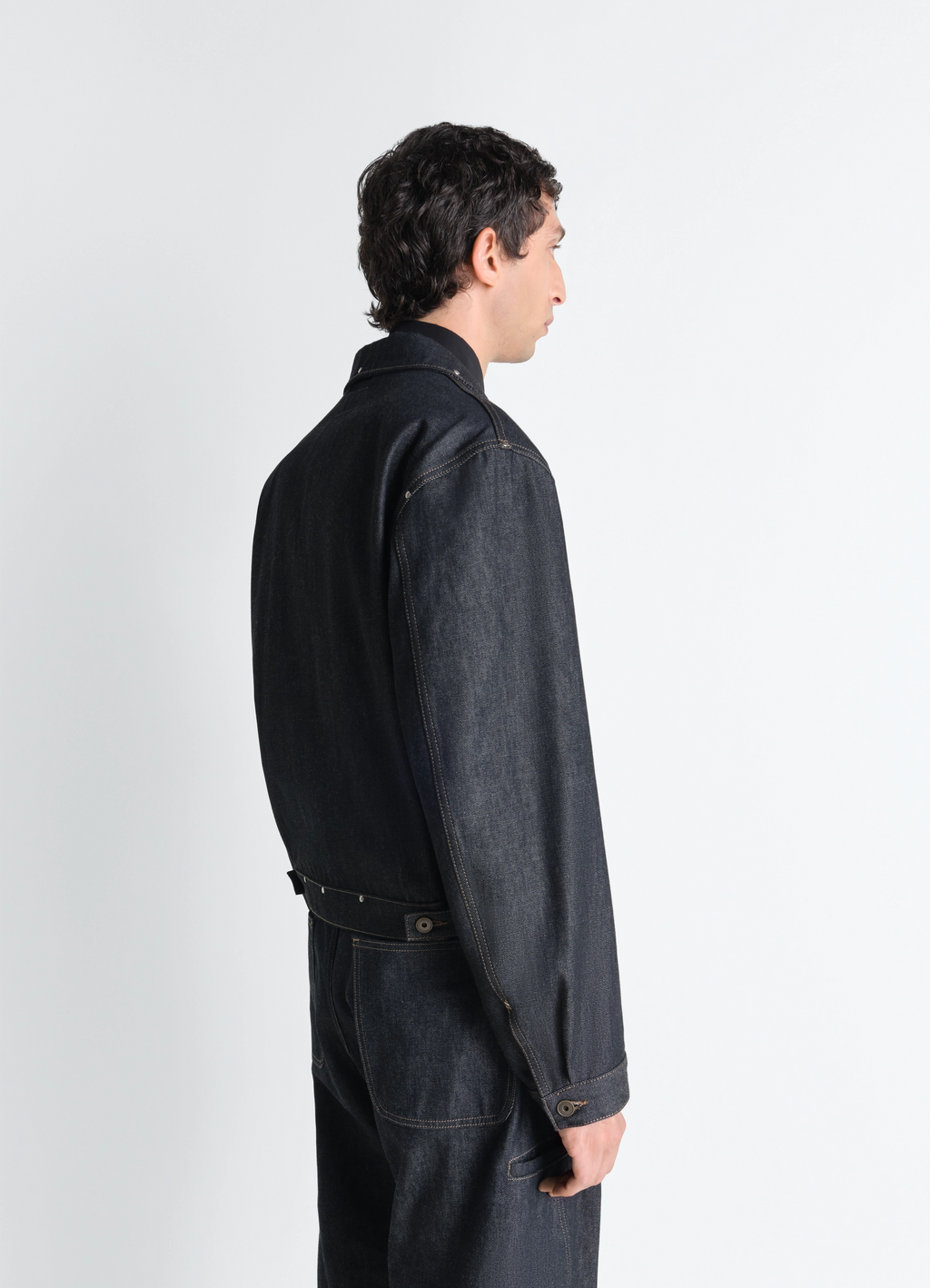 スタッズ付きデニムトラッカージャケット