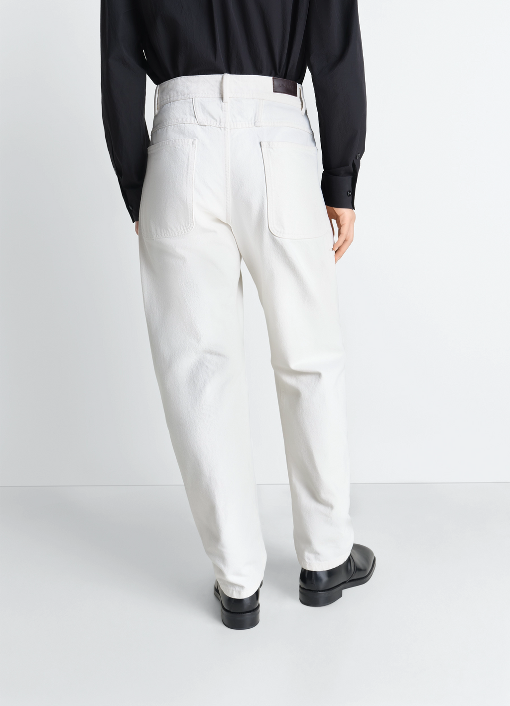 Verdrehte arbeitshose aus denim