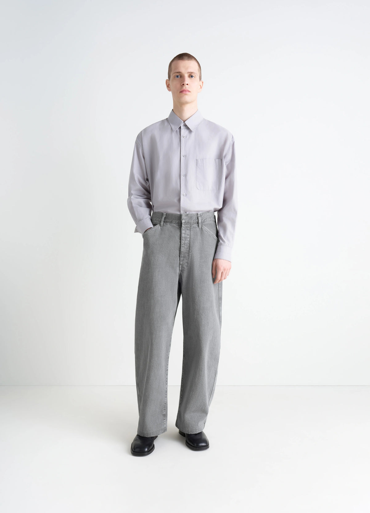 Lemaire Maxi Workwear Pants in Heather Garment Dyed Snow Heavy Den, model shot, front view oversized wide leg