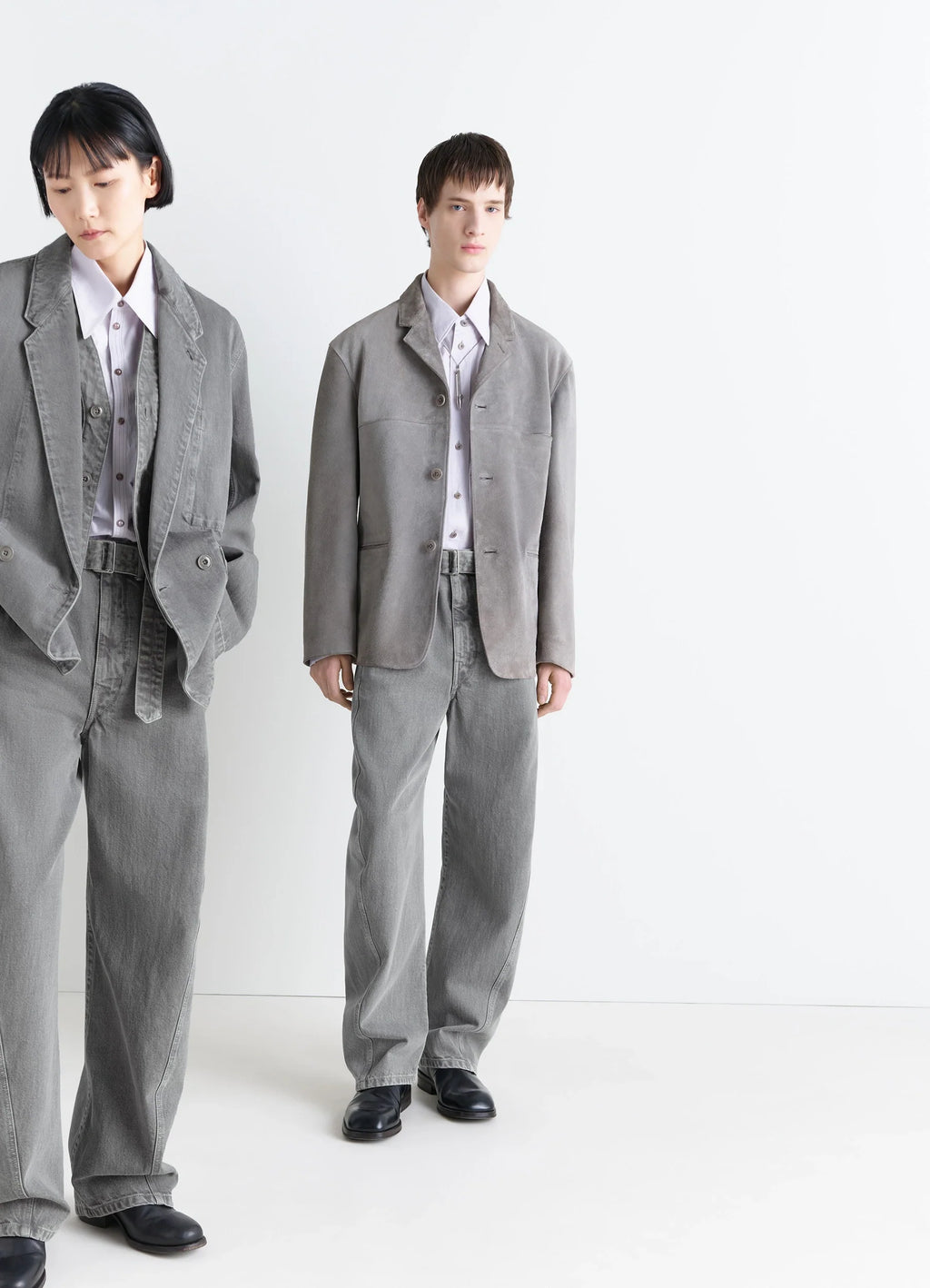 Lemaire twisted belted pants in snowy patina thick denim, model shot, front view rounded leg, unisex fit