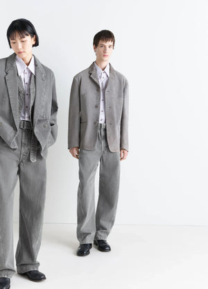 Lemaire twisted belted pants in snowy patina thick denim, model shot, front view rounded leg, unisex fit