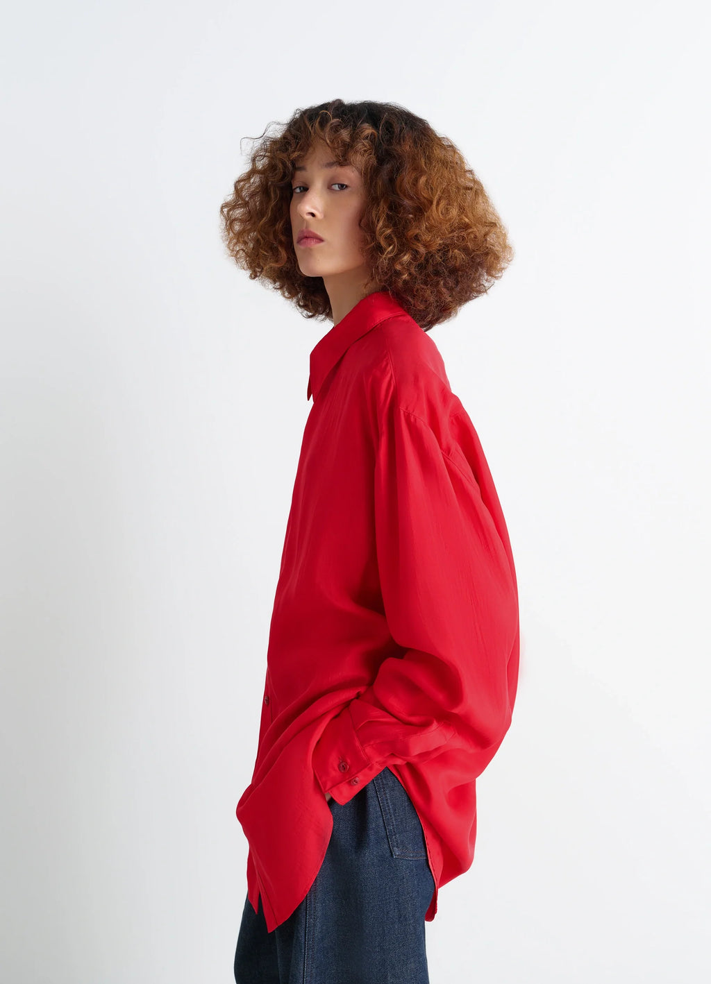 Lemaire flowing shirt in parachute silk chiffon, model shot, side profile view relaxed long sleeve