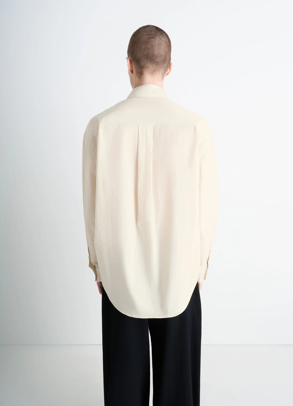 Lemaire regular shirt in washed cotton and silk, model shot, back view curved hem