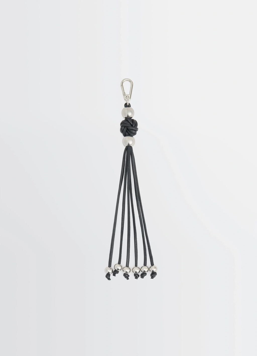 Infinite love knot key ring in nappa lamb leather, product shot, front view infinity knot, tassel