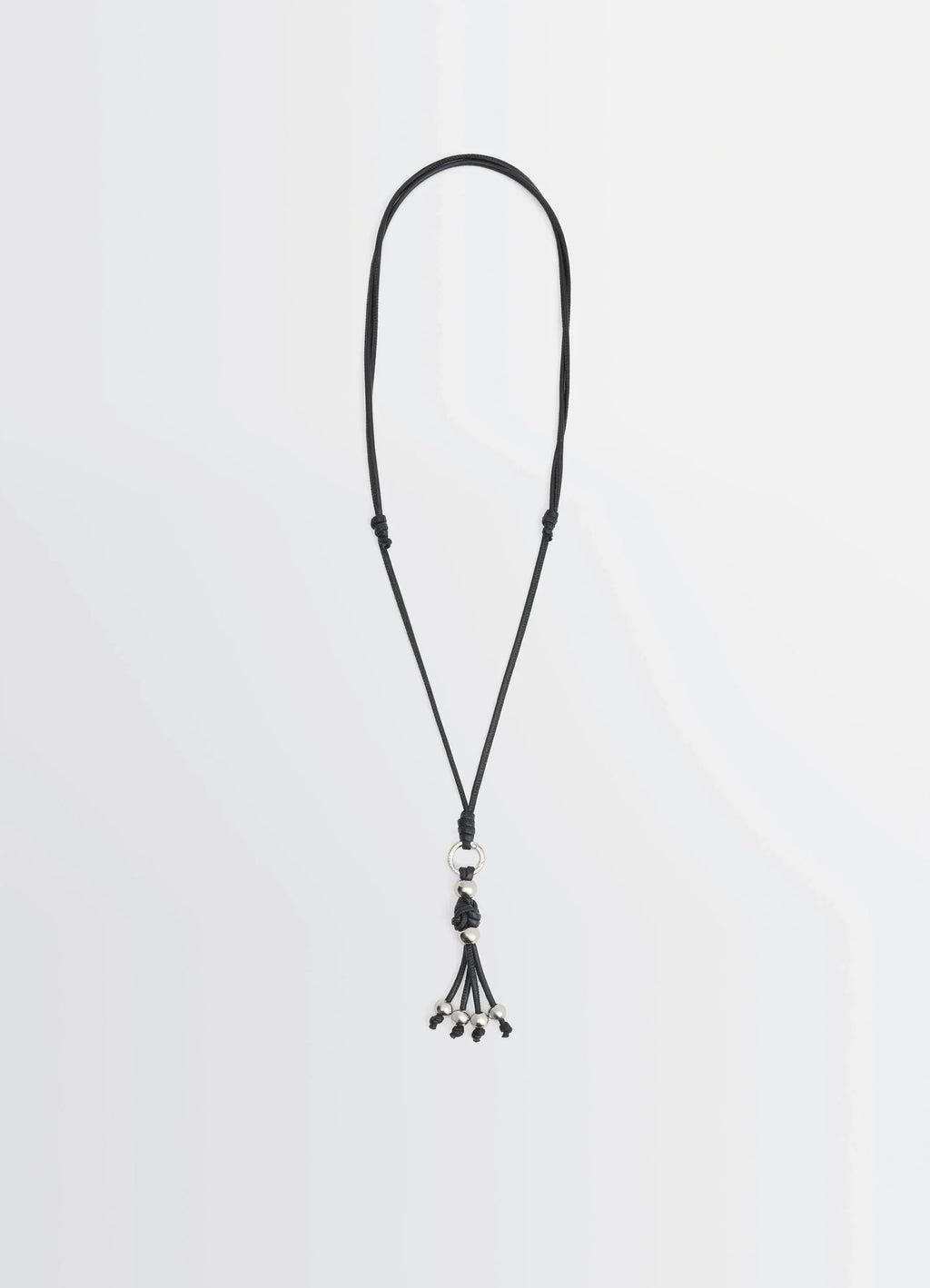 Infinite love knot badge holder in nappa lamb leather, product shot, front view knot detail