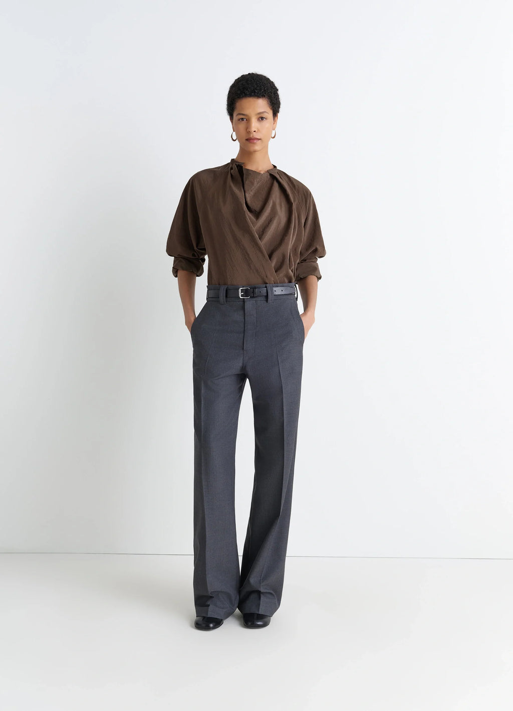 Lemaire twisted top in brown dry silk blend, model shot, three-quarter view soft draped sleeves