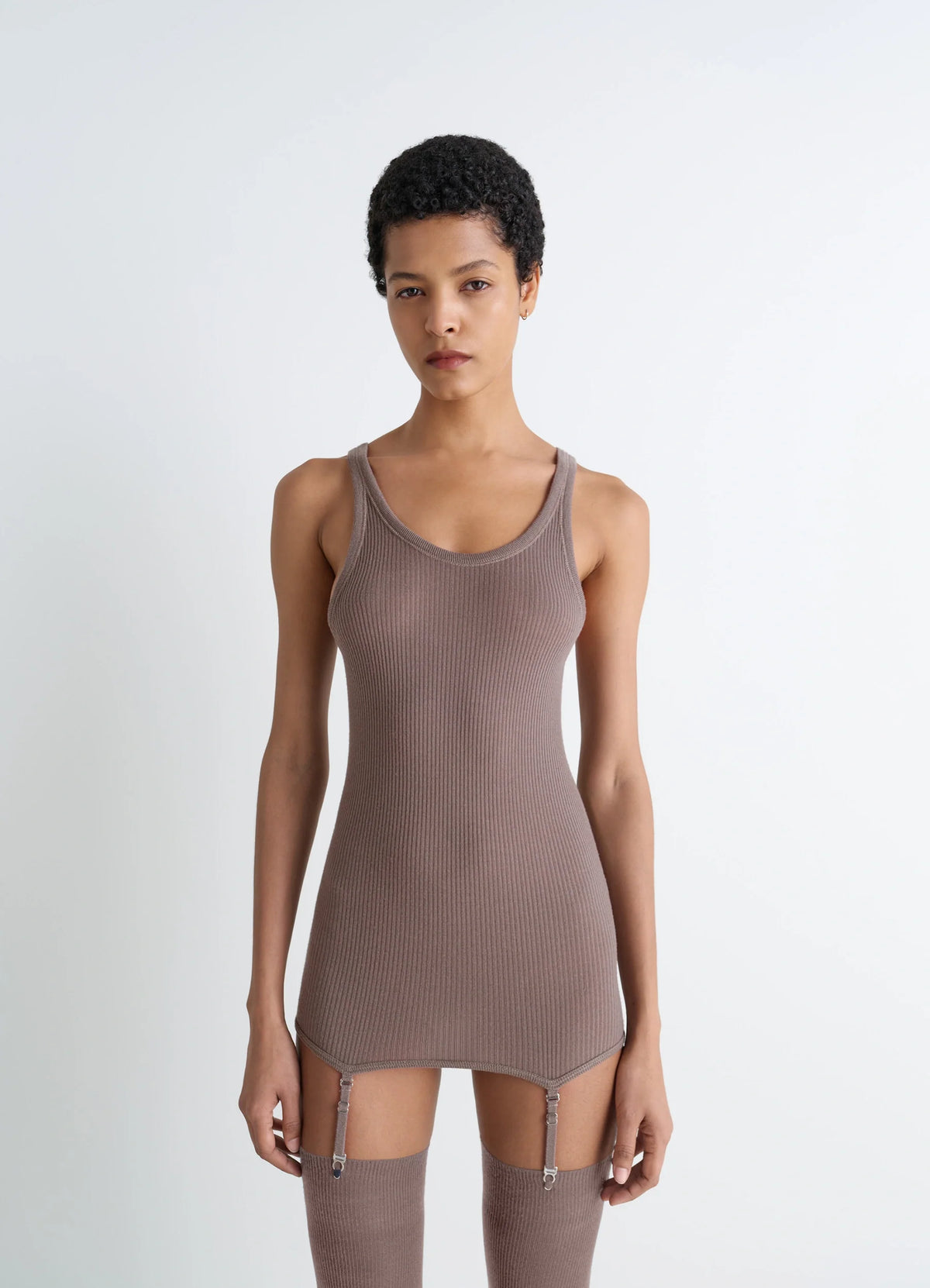Lemaire Seamless Short Sleeves Tank in Fine Ribbed Merino Wool, model shot, Front view Fitted with removable suspenders