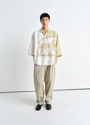 Philippe weisbecker short sleeve po in light cotton pattern, model shot, front view three-quarter sleeves, curved hem