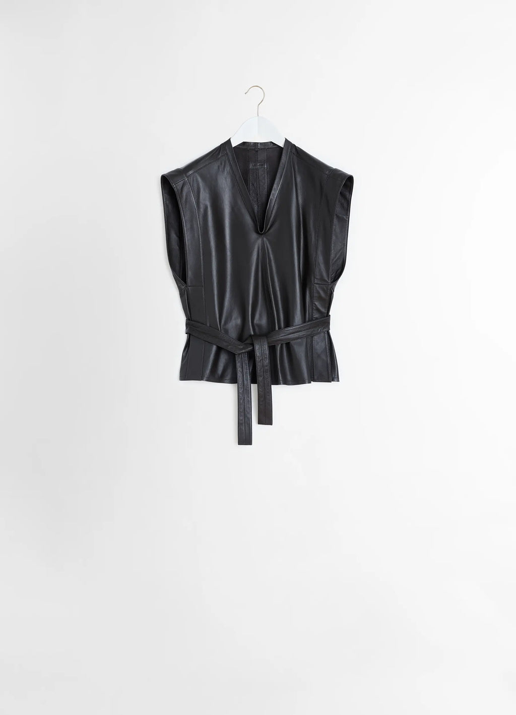 Lemaire leather chasuble in light lamb leather, product shot, hanging view sleeveless with drop waist