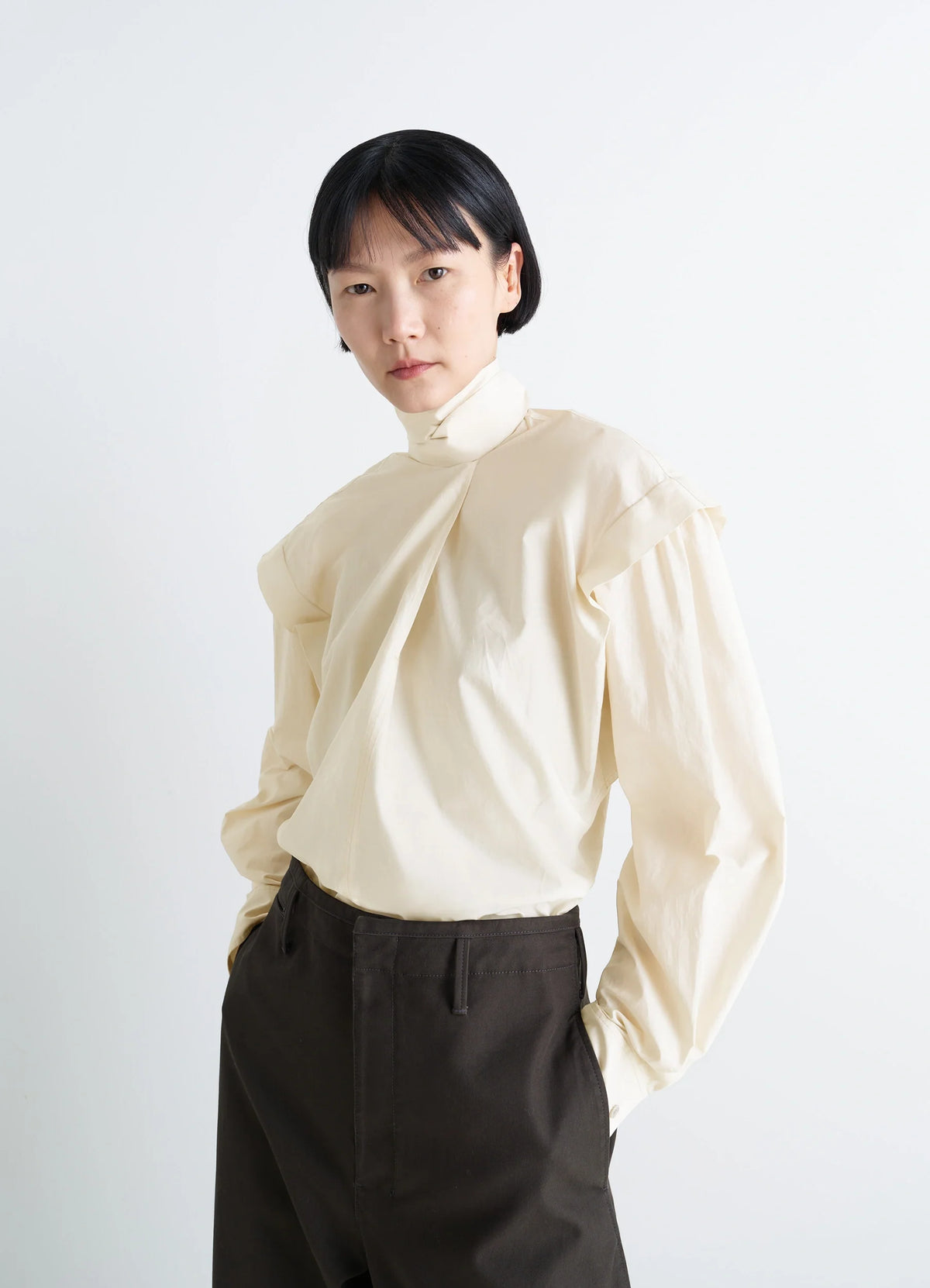 Lemaire Ascot Blouse in Ivory Washed Cotton-Silk, model shot, Front view Loose fit with ascot tie